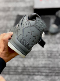 Jordan 4 Kaws Black